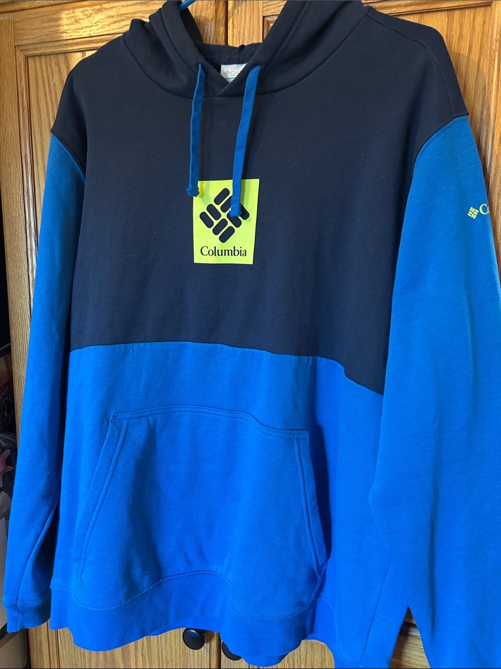 Columbia Men's Black and Bright Blue Colorblock Hoodie with Neon Logo